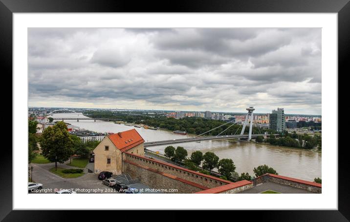 A view across the River Danube, Most SNP Bridge, and Ovsiste, Bratislava Framed Mounted Print by SnapT Photography