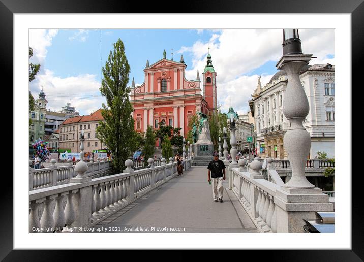 A view of the Franciscan Church across the Tromostovje or Triple Bridges Framed Mounted Print by SnapT Photography