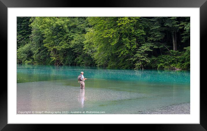A man fly fishing for marble trout on the Soca River at Tolminka, near Tolmin, Slovenia Framed Mounted Print by SnapT Photography