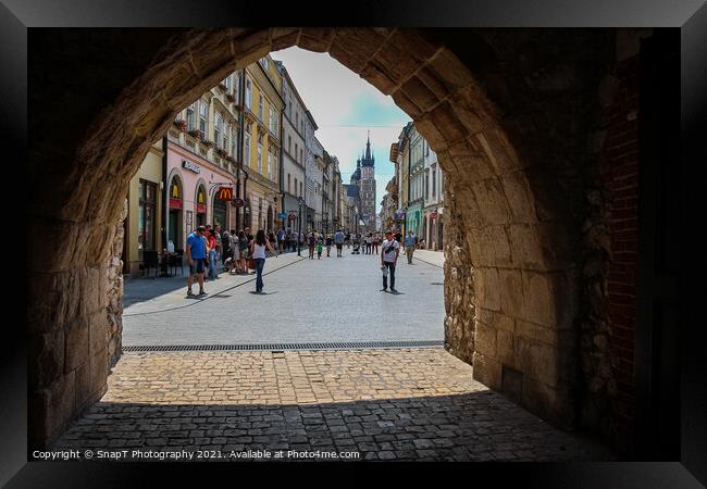 The archway entrance in St.Florian's Gate to the old town of Krakow, Poland Framed Print by SnapT Photography