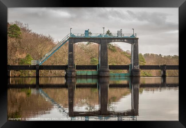 Flood gates reflecting on Earlstoun Loch at Earlstound Dam Framed Print by SnapT Photography