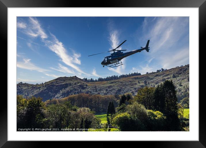 Helicopter flying low at Beddgelert Snowdonia  Framed Mounted Print by Phil Longfoot