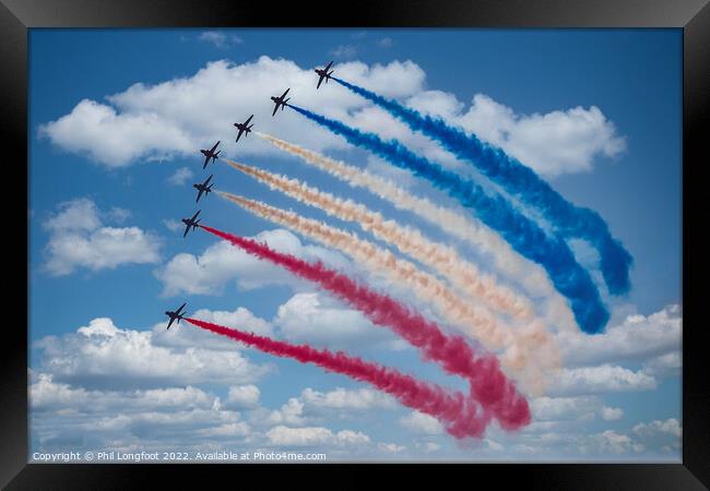 Multicoloured trails by the Red Arrows Framed Print by Phil Longfoot