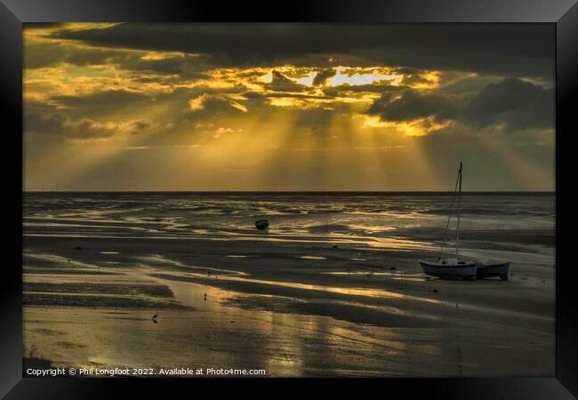 Sunbeams over coast of Wirral Framed Print by Phil Longfoot