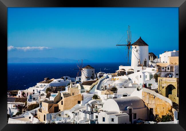 Two Windmills in Oia, Santorini, Greece. Framed Print by Ron Thomas