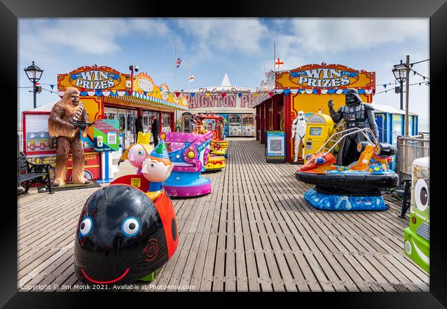 On the pier in Paignton. Framed Print by Jim Monk