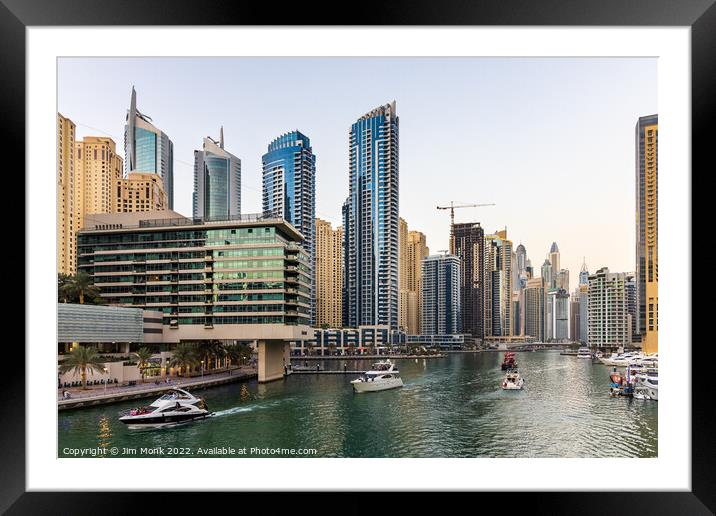Cruising along in Dubai Marina Framed Mounted Print by Jim Monk