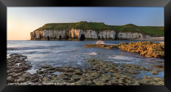 Sunrise at Thornwick Bay Framed Print by Jim Monk