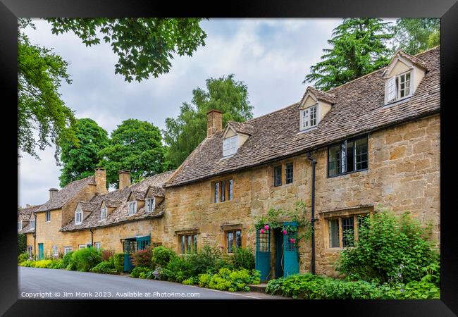 Idyllic Charm of Cotswold Stone Cottages Framed Print by Jim Monk