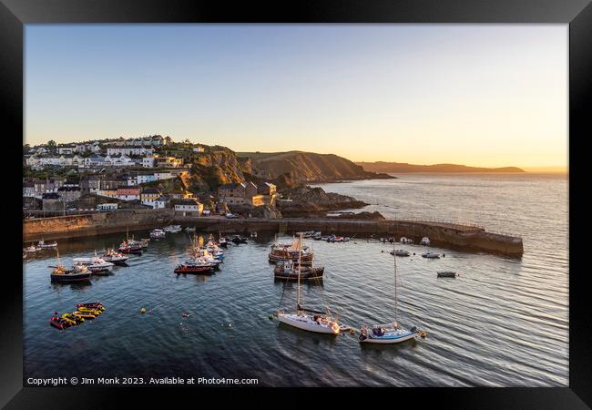 First light at Mevagissey Harbour Framed Print by Jim Monk