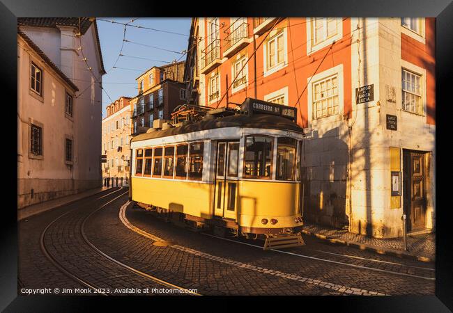 Vintage Tram number 28 in Lisbon Framed Print by Jim Monk