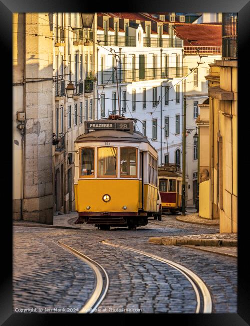 Vintage Yellow Tram in Lisbon Framed Print by Jim Monk