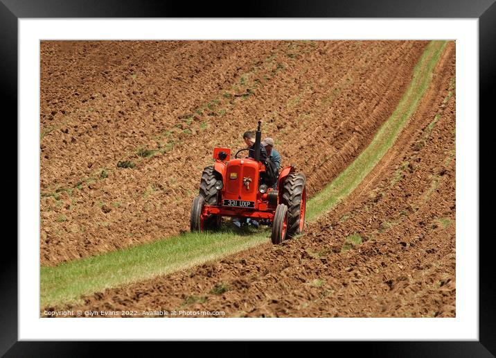 Ploughing the Land. Framed Mounted Print by Glyn Evans
