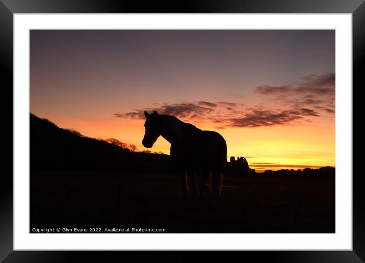 Winter sunset at Ogmore Castle Framed Mounted Print by Glyn Evans