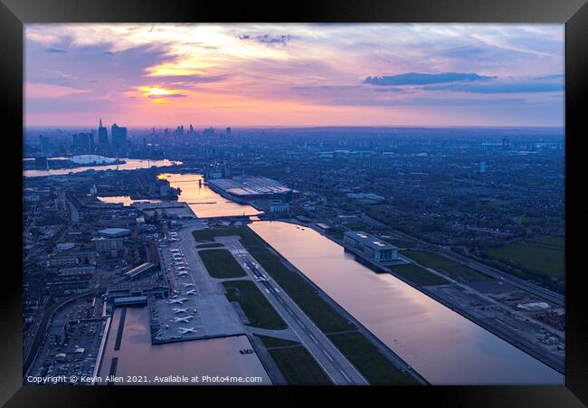 Sunset over City Airport, London. Framed Print by Kevin Allen