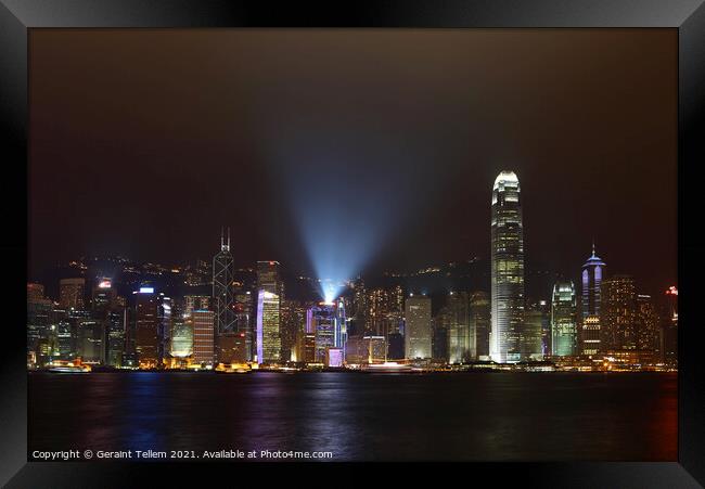 Hong Kong Island, Victoria Harbour waterfront including Two International Finance Centre, Hong Kong. Symphony of Lights display Framed Print by Geraint Tellem ARPS