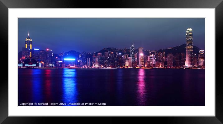 Hong Kong Island, Victoria Harbour waterfront including Hong Kong Convention and Exhibition Centre, and Central Plaza during A Symphony of Lights display. Framed Mounted Print by Geraint Tellem ARPS