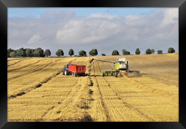 Harvesting barley near Wylam Northumberland. Framed Print by mick vardy