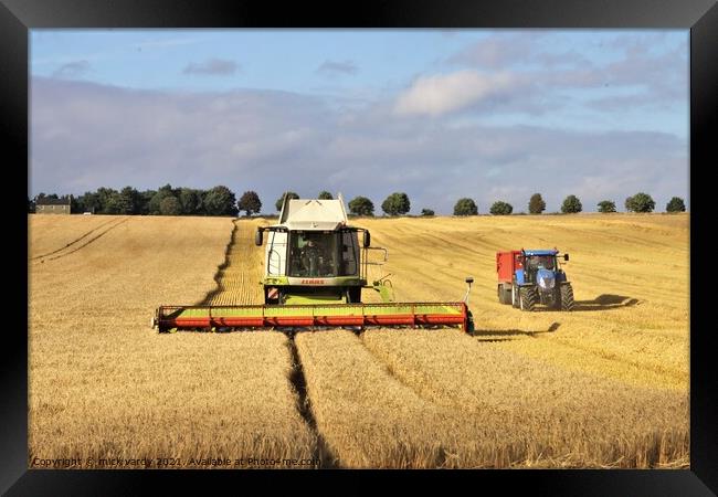 Cutting barley in Northumberland. Framed Print by mick vardy