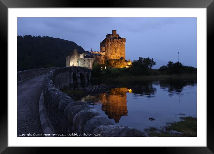 Eilean Donan Castle at night. Framed Mounted Print by ANN RENFREW