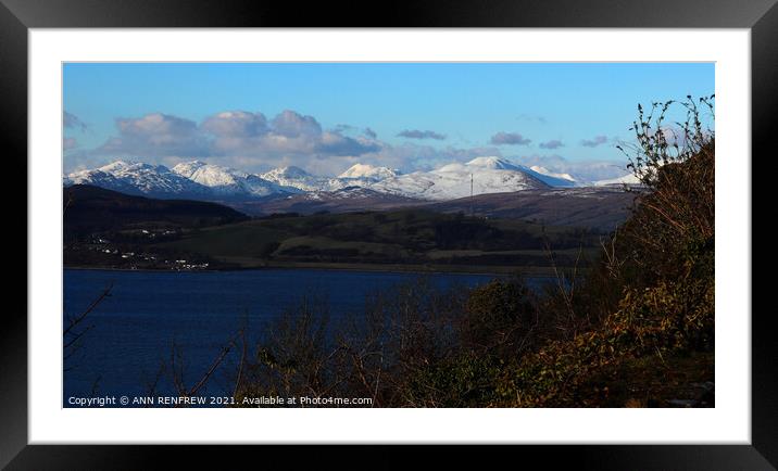 Snow capped mountains of Scotland. Framed Mounted Print by ANN RENFREW