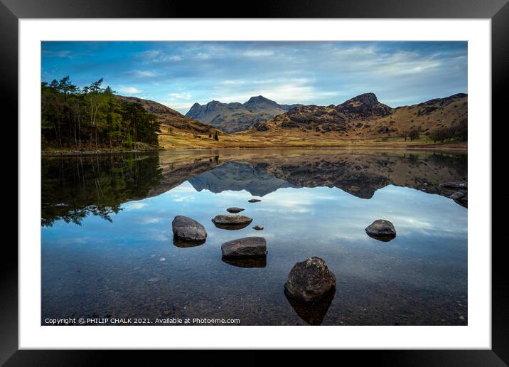 Blea tarn dead calm in the lake district 492  Framed Mounted Print by PHILIP CHALK