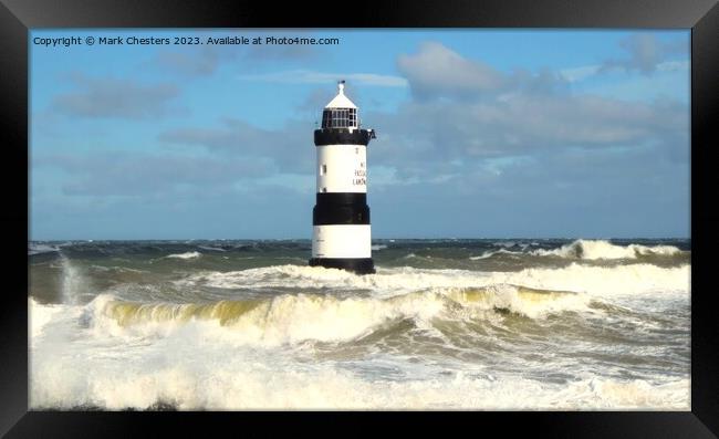 Majestic Penmon Lighthouse in Turbulent Seas Framed Print by Mark Chesters