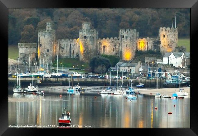Conwy Castle and boats at dusk Framed Print by Mark Chesters