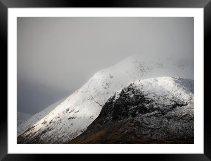 Snow covered mountains of Glencoe Framed Mounted Print by Anthony McGeever