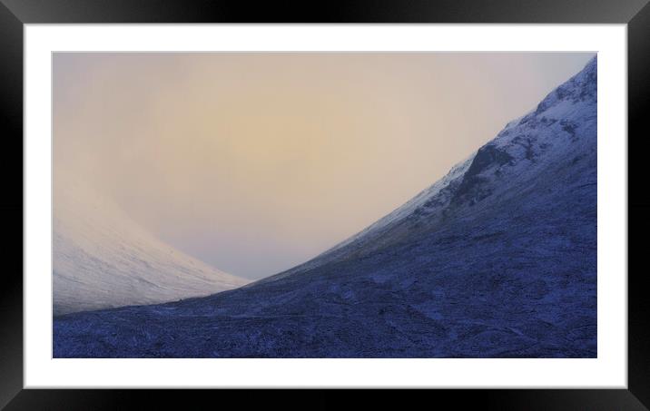 A backlit Mountain Valley Framed Mounted Print by Anthony McGeever