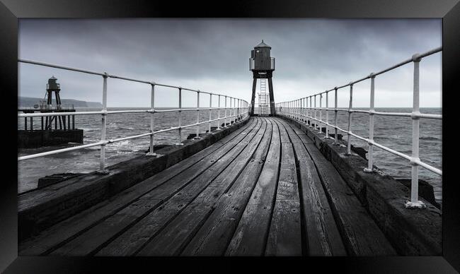 Whitby's East Pier in black and white  Framed Print by Anthony McGeever