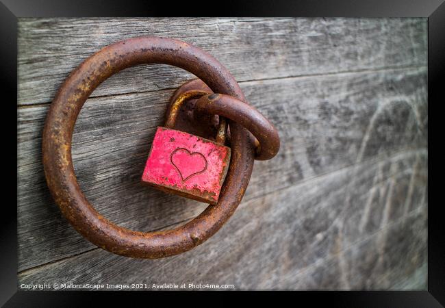 rusty padlock with a heart Framed Print by MallorcaScape Images