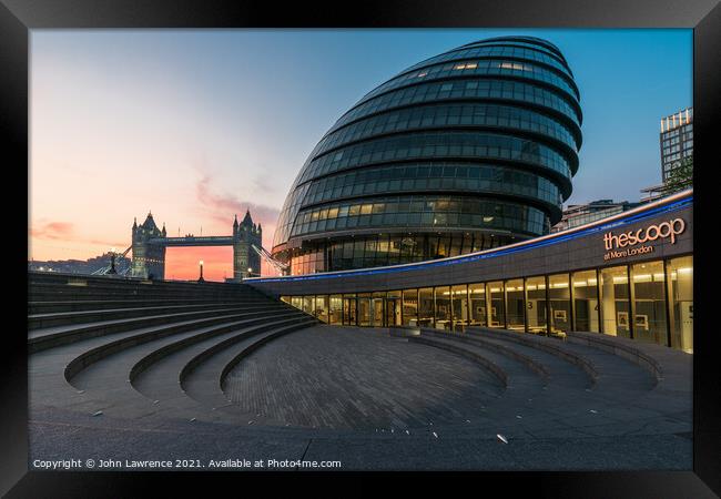 Sunrise at The Scoop London  Framed Print by John Lawrence