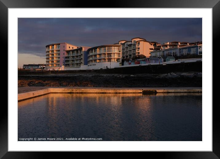 Westward Ho! seaside apartments at sunset Framed Mounted Print by James Moore