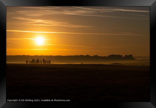 Sunrise over Stonehenge  Framed Print by Ed Whiting