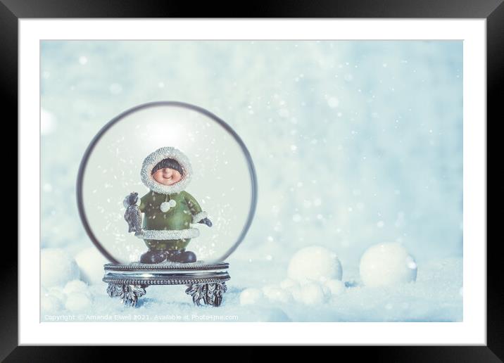Snowglobe With Eskimo Framed Mounted Print by Amanda Elwell
