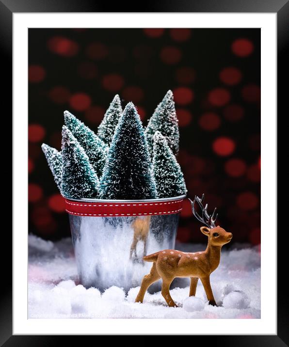 Reindeer With Christmas Trees Framed Mounted Print by Amanda Elwell
