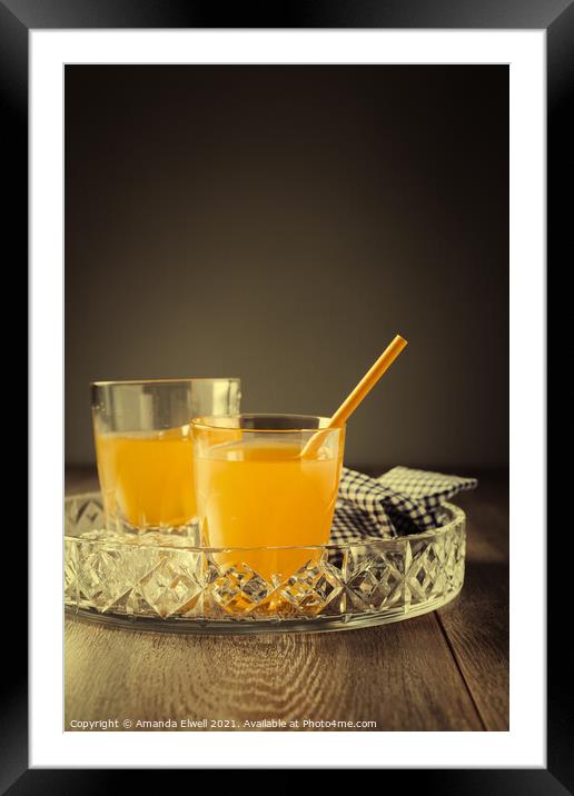 Glasses Of Orange Juice Framed Mounted Print by Amanda Elwell