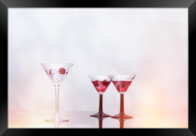 Cocktail Glass Filled With Ice  Framed Print by Amanda Elwell
