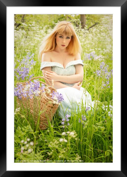 Woman Sitting In Spring Meadow Framed Mounted Print by Amanda Elwell