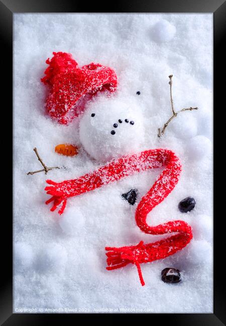Melted Snowman Framed Print by Amanda Elwell