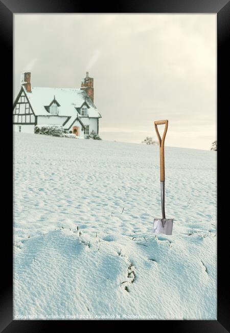Digging Out Snow Framed Print by Amanda Elwell