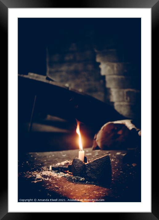 Candle Wedged In Axe Framed Mounted Print by Amanda Elwell