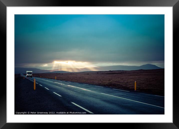 Camper Van On An Icelandic Road With Light Shafts Framed Mounted Print by Peter Greenway