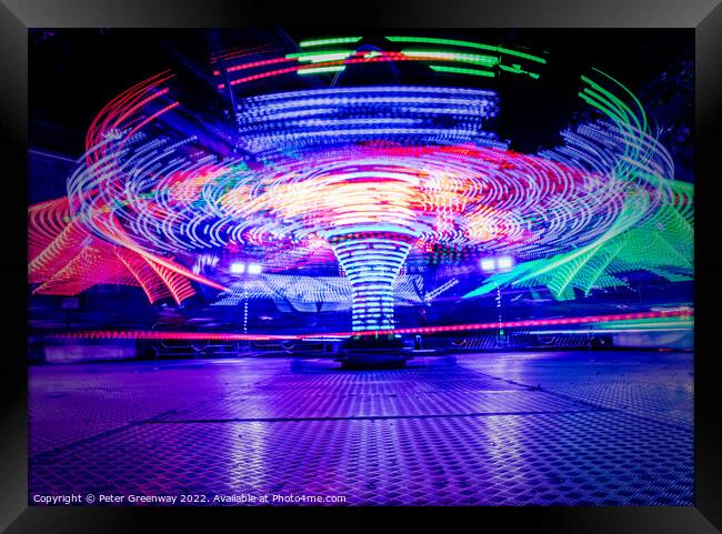 Light Trails From The Twisters Fairground Ride At The Woodstock  Framed Print by Peter Greenway