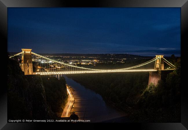 Traffic Light Trails Under The Clifton Suspension Bridge, Avon A Framed Print by Peter Greenway