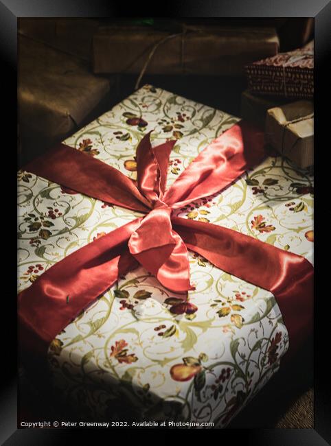 Wrapped Christmas Present Tied Up In Red Ribbon Framed Print by Peter Greenway