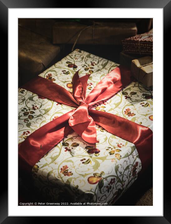 Wrapped Christmas Present Tied Up In Red Ribbon Framed Mounted Print by Peter Greenway