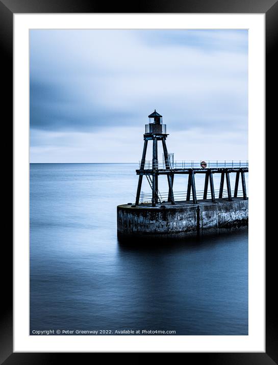 The Red Shipping Lighthouse On The East Pier At Whitby On A Cold Framed Mounted Print by Peter Greenway