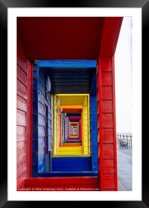 View Through The Porches Of Colourful Wooden Beach Huts At Saltb Framed Mounted Print by Peter Greenway